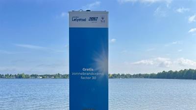 Paal voor gratis zonnebrand op het strandje bij 't Bovenwater