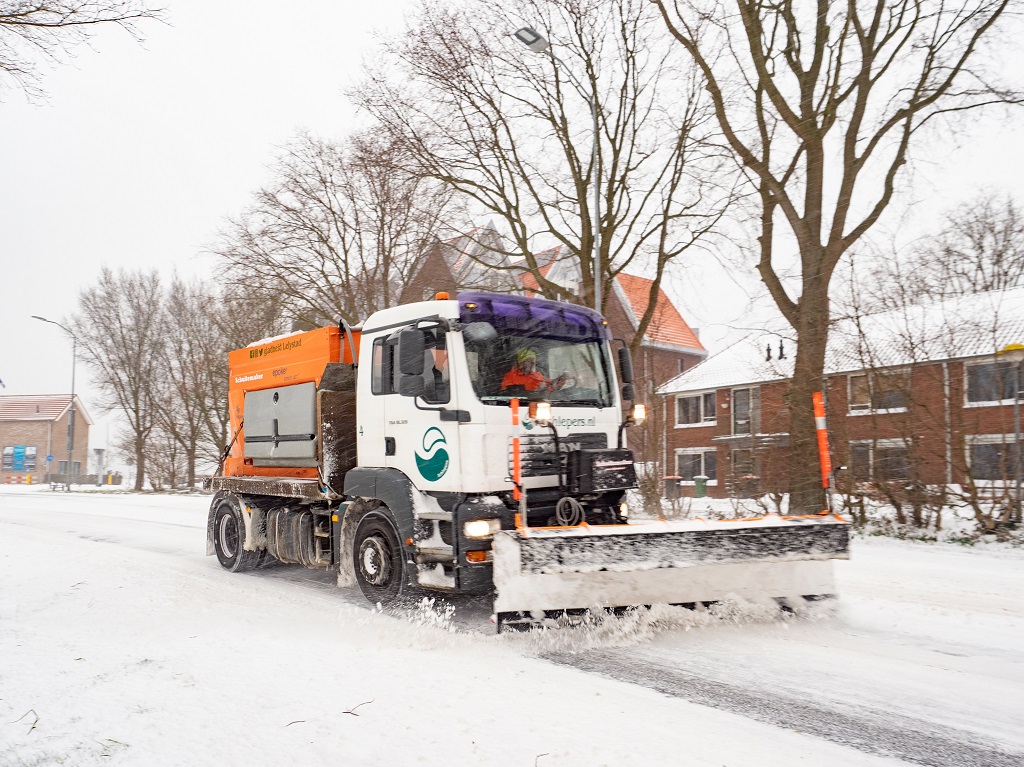 Sneeuwschuiver in actie